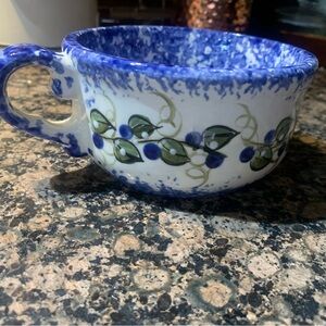 Artistic Blue and White Ceramic Cup with Leaf and Berry Design